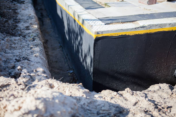 Professional Interior Drainage System technician working in Far Hills, NJ